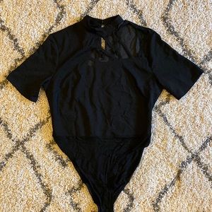 Short sleeve bodysuit with asymmetrical cutout design